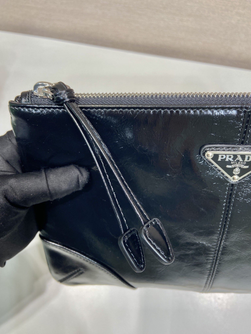 Pra*a clutch bags